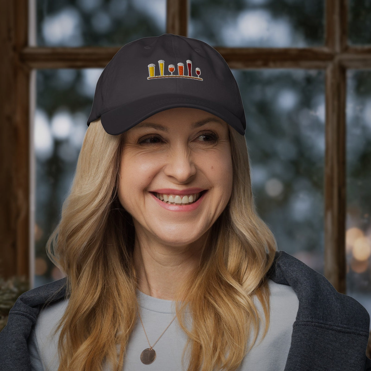 Woman wearing the Winter Flight Embroidered Dad Hat in Dark Grey