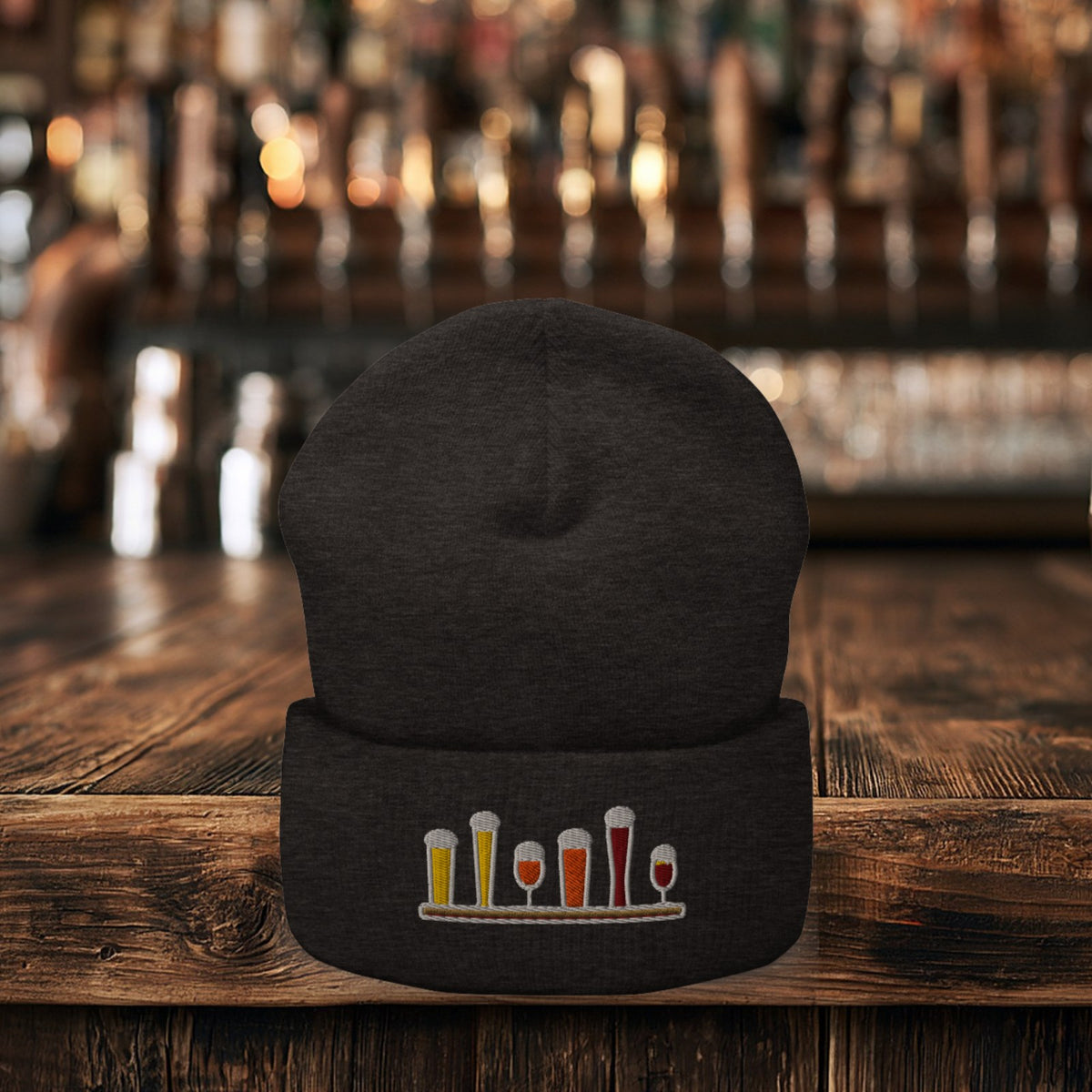 Winter Flight Embroidered Cuffed Beanie in Dark Grey on the bar