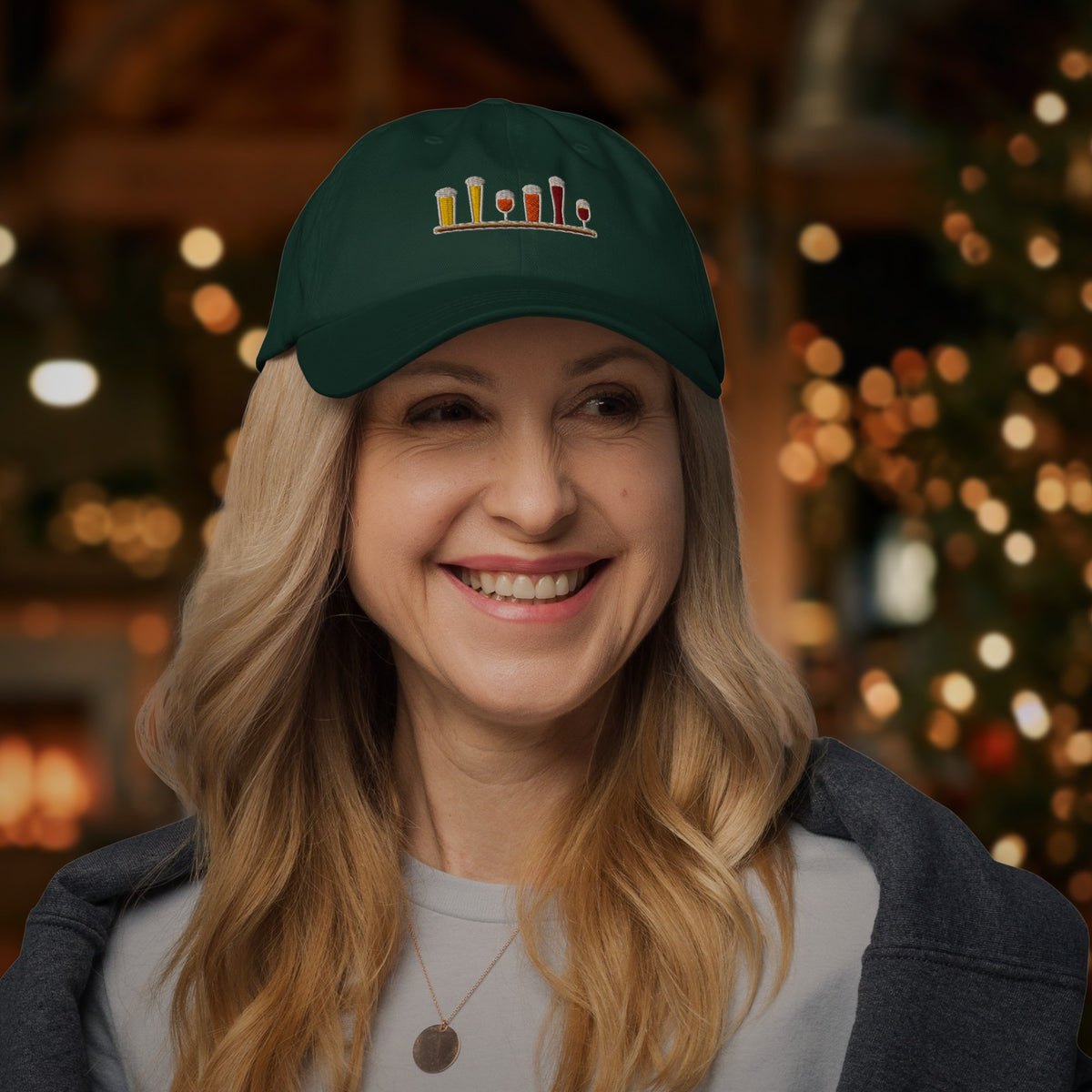 Woman wearing the Winter Flight Embroidered Dad Hat in Spruce