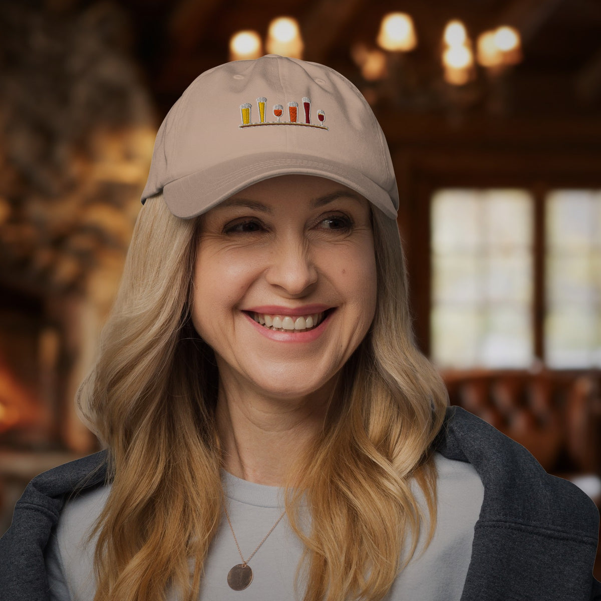 Woman wearing the Winter Flight Embroidered Dad Hat in Stone