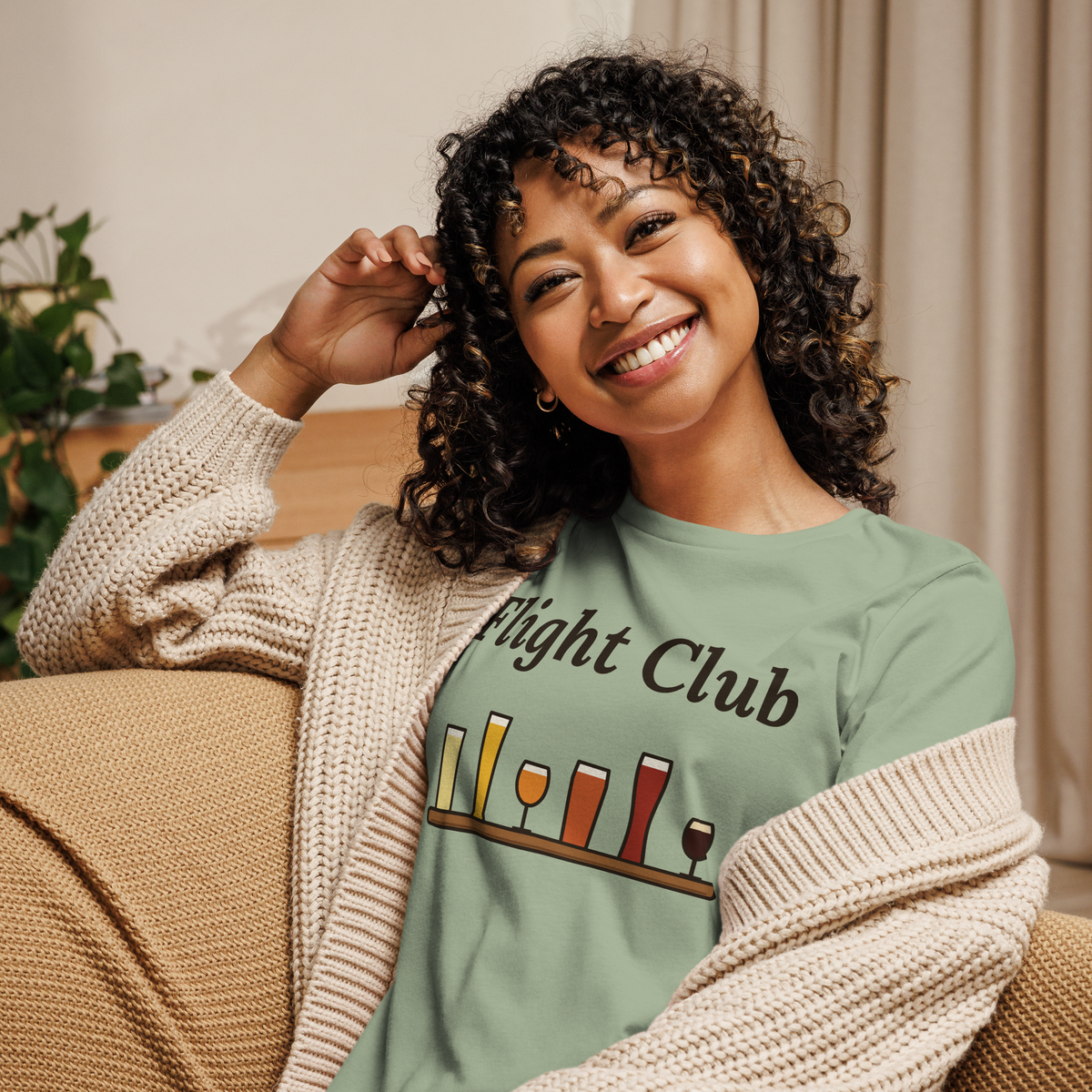 Smiling woman in the Sage Women's Flight Club T-Shirt